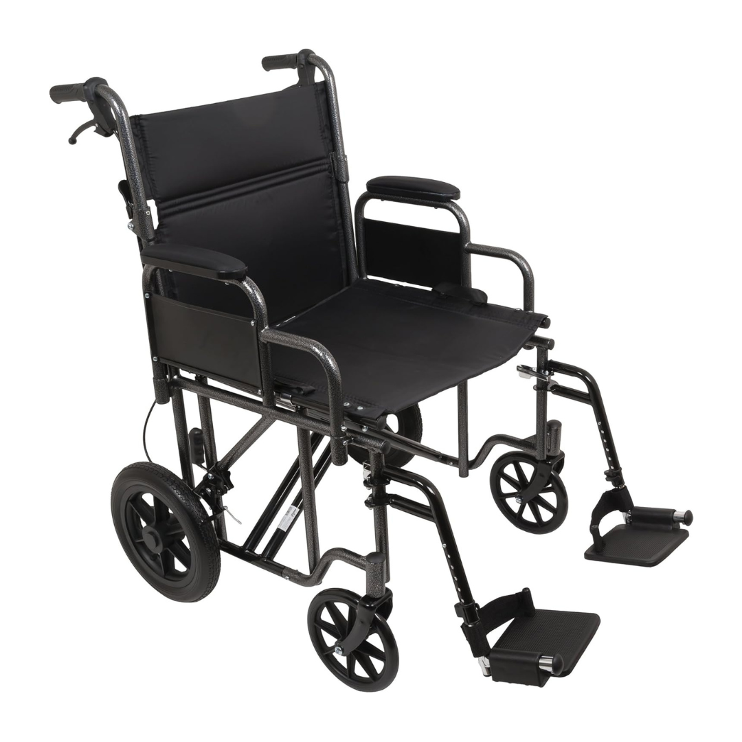 The ProBasics Folding Bariatric Transport Chair with Desk Arms is shown empty against a white background. It features a black frame, cushioned seat and back, desk-length armrests, 12-inch rear wheels, smaller front wheels, and footrests.